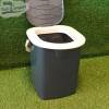 WC portátil estilo cubo con asa