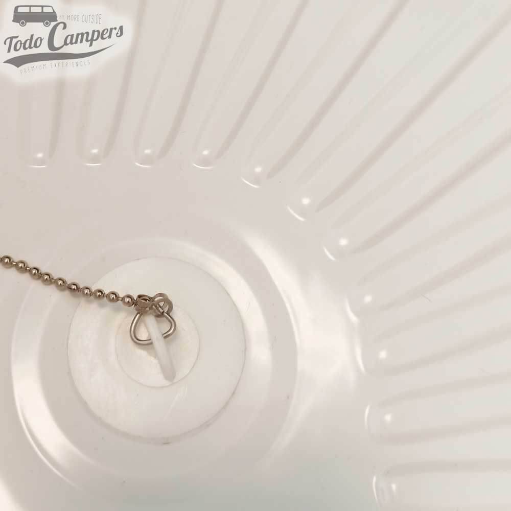 desagüe recto de 20 mm Tipo H con tapón instalado en plato de ducha