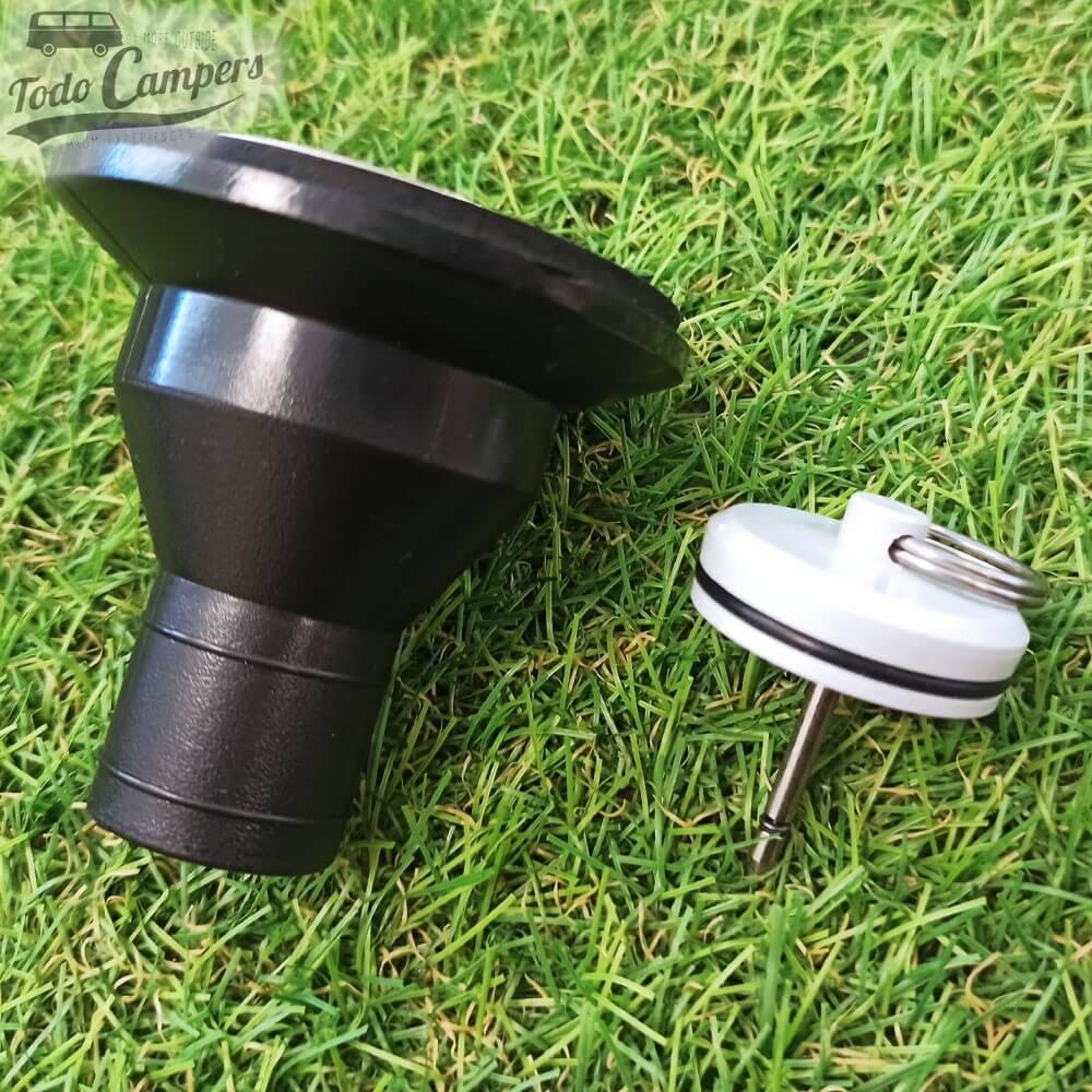 Desagüe recto con tapón hermético sin cadena.