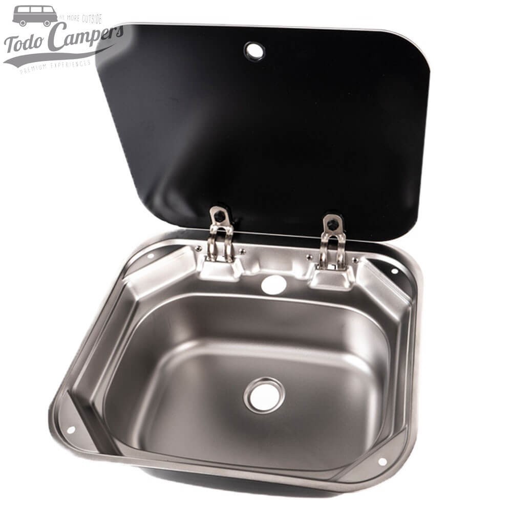 foto de catálogo del fregadero Carbest con tapa de cristal abierta